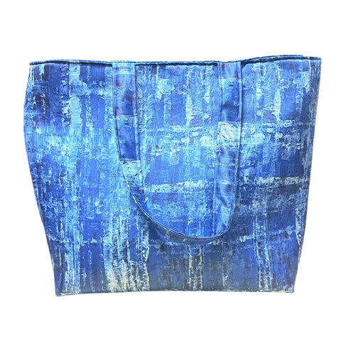 Blue textured tote bag on a white background