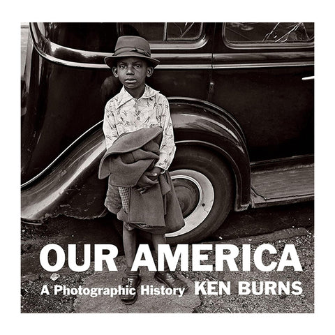 Book cover of 'Our America: A Photographic History' by Ken Burns featuring a young boy with a hat against a vintage car.