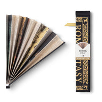 Two black folding fans depicting a cover of a book with the text 