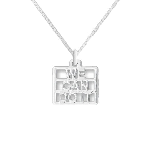 A silver pendant with the text 