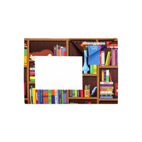 A enveloped with a blank white space on the left hand side for a address. The envelope features a wood color background with shelves filled on colorful book spines and a cat lounging on the left hand side above the white space.