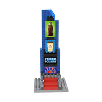 A miniature model of Times Square with a Coca-Cola bottle and a coffee cup 