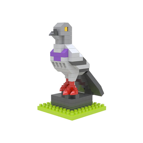 A miniature pigeon made of interlocking bricks on a green base