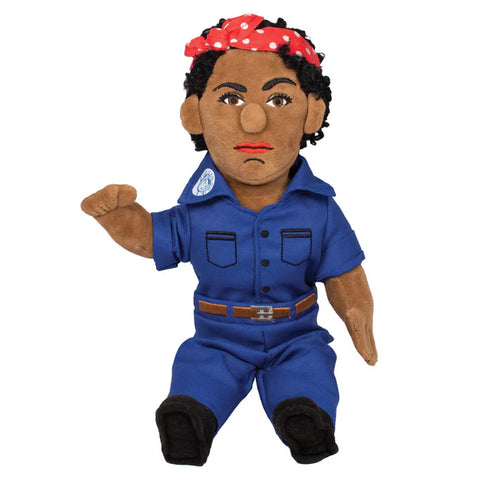 A Black Rosie the Riveter doll in a blue jumpsuit, wearing a red and white polka dot bandana
