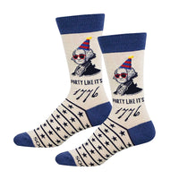 Two socks with a design of George Washington wearing sunglasses and a party hat, with 'Party Like It's 1776' text  and blue accents