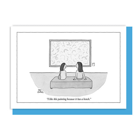 A black-and-white cartoon illustration on a white notecard with a blue envelope behind the notecard, showing two people sitting on a bench in front of a framed abstract painting. The caption reads, 'I like this painting because it has a bench.