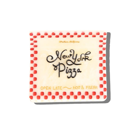 A square-shaped hair claw clip featuring a New York Pizza box. The claw clip has a cream-colored center with black script reading 'New York Pizza' and gold text reading 'OPEN LATE ~ HOT & FRESH'.