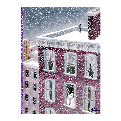 A square card featuring a winter city scene with snow falling over a red brick building, white rooftops, dark windows, and a small snowman figure near one window.