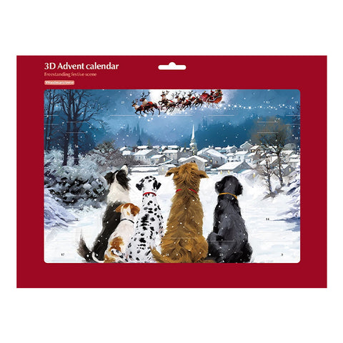 An Advent calendar featuring a festive winter scene with four dogs looking up at Santa Claus flying overhead. The product is presented in its red cardboard packaging with a hanging tab, set against a plain white background.