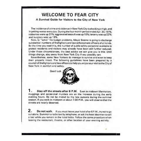 A black-and-white printed informational brochure titled 'WELCOME TO FEAR CITY' with paragraphs of text and a small black-and-white illustration of a hooded skull head.
