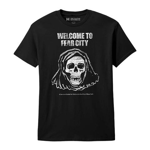 A black shirt featuring the text 'WELCOME TO FEAR CITY' above a hooded grim reaper skull illustration, centered on a plain white background with the text "A Survival Guide for Visitors to the City of New York" at the bottom
