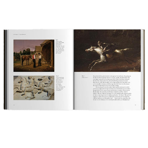 An open book showing two printed pages with text and historical artwork, including a painting of a horse rider and a small carved figure, photographed against a plain white background.