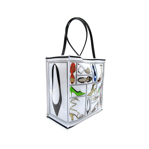 A tote bag featuring a printed design with various illustrations of shoes from the Stuart Weitzman collection.
