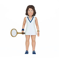 A brown hair woman wearing eyeglasses and a white tennis dress with a blue v accent collar holding a tennis racket with blue tennis sneakers and light blue laces